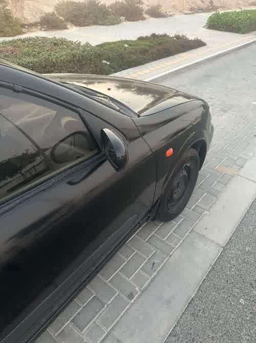 Nissan 2005 for sale in Doha, Qatar — photo 5